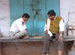 Two guys playing chess in Bundi