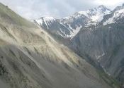 You do not see a road but it is the road from Srinagar to Leh by Ivana.  Tags: Jammu and Kashmir, Srinagar, Leh, Zojila Pass.