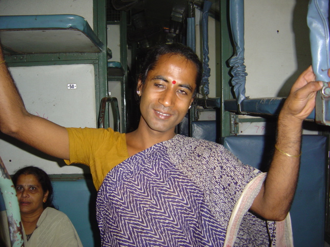 http://www.indiamike.com/files/images/16/99/11/hijra-on-the-train.jpg
