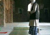 Man praying by Arjun