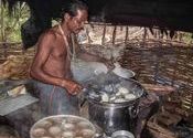 Breakfast Idly Cook by Lou Wilson.  Tags: Odisha, Koraput.