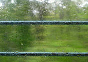 Rain through rail window by rajeshathrady.  Tags: Karnataka, Karwar.