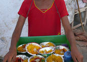 Flowers ??? Veraval Ghats by Lou Wilson.  Tags: Veraval, Gujarat, People and Faces, Food in India, flowers.