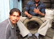 Repairing Tires by bruadair.  Tags: Uttar Pradesh, Meerut.