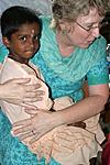 this-is-me-this-is-us-in-india-md-laura-holding-girl.jpg