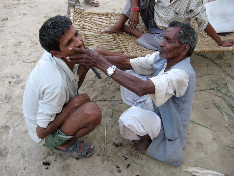 India Travel  Pictures: Kallu village barber